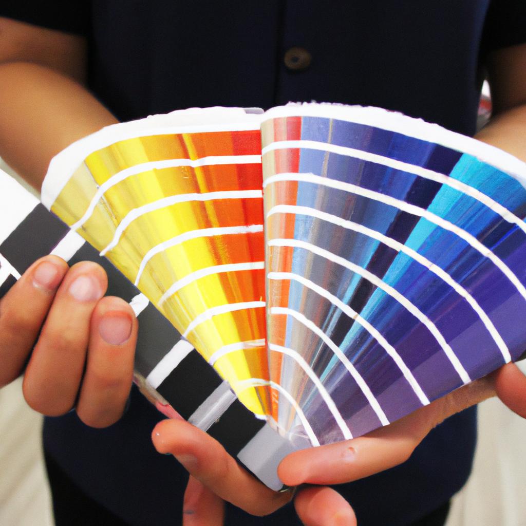 Person holding color swatches